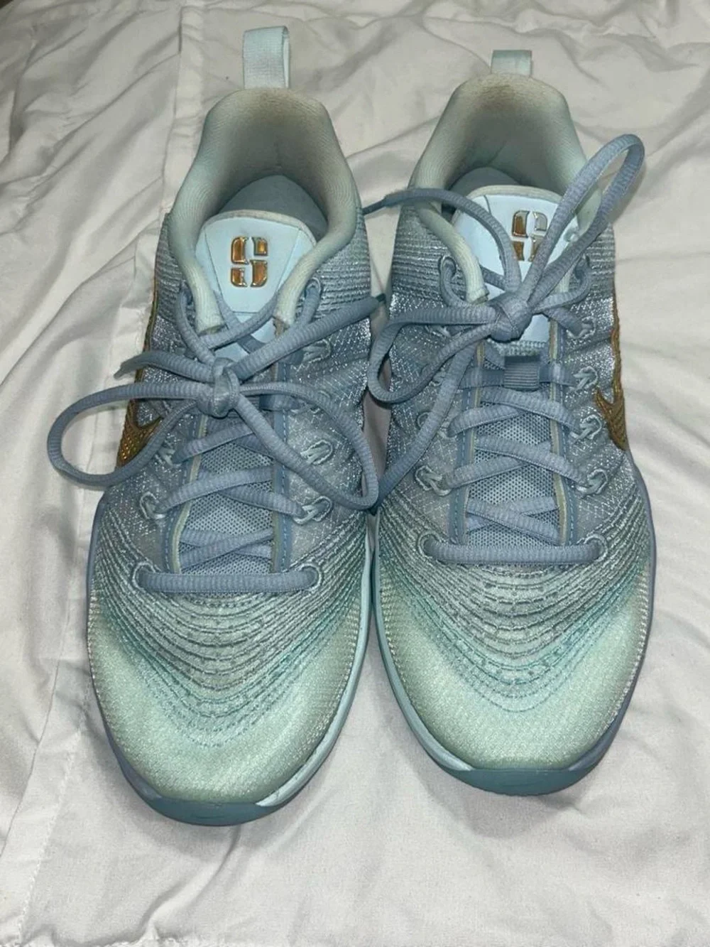 Nike Women's Light Blue Sneakers with Iridescent Gold Swoosh